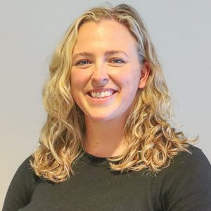 Professional headshot of Carly Odesina