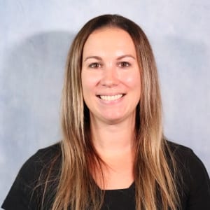 Professional headshot of Carly Taylor