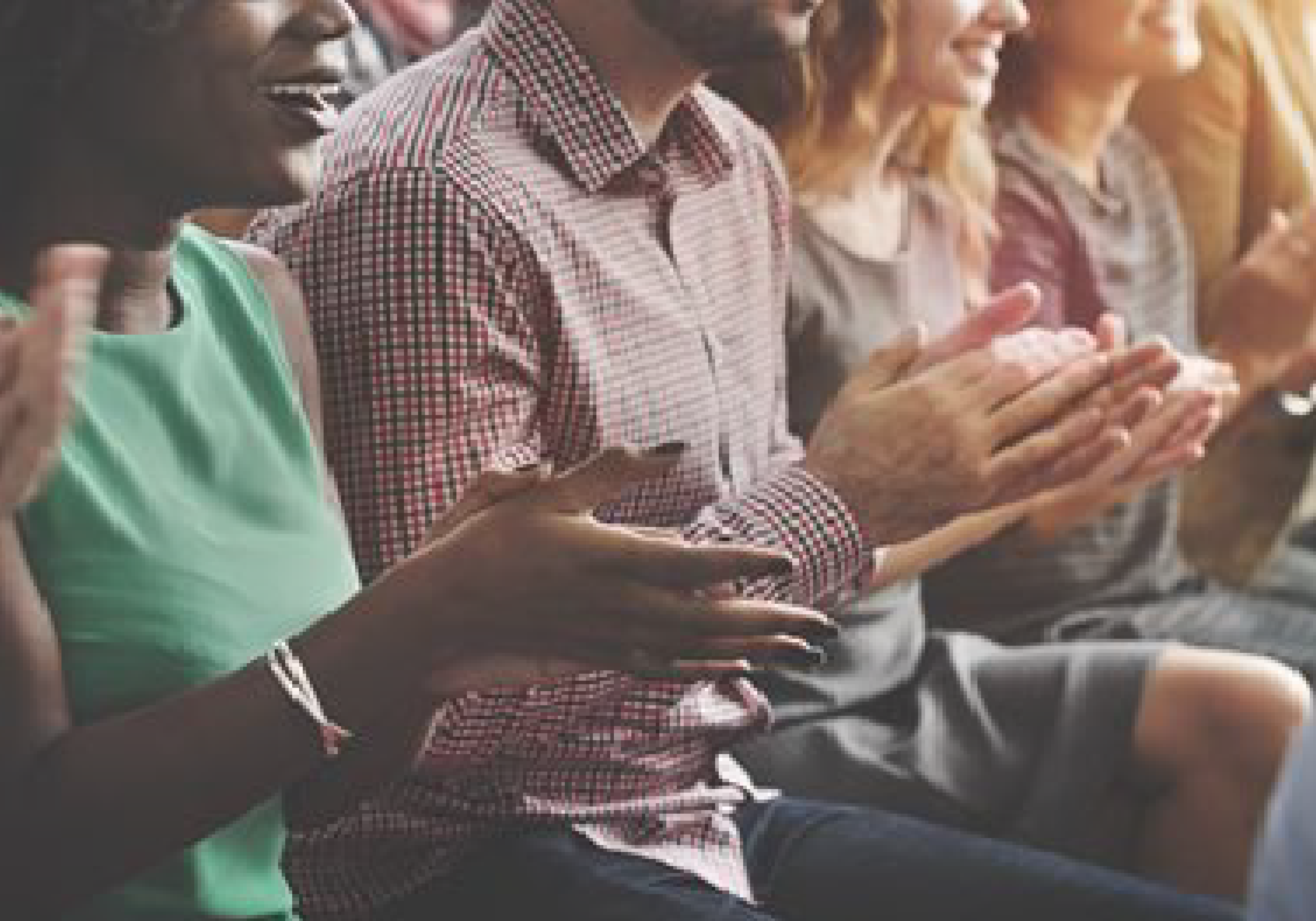 Alcohol, Substance Use & Support Box: Audience seated and clapping during an event or presentation, symbolizing community support and positive engagement.