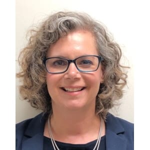 Professional headshot of Karen McComb