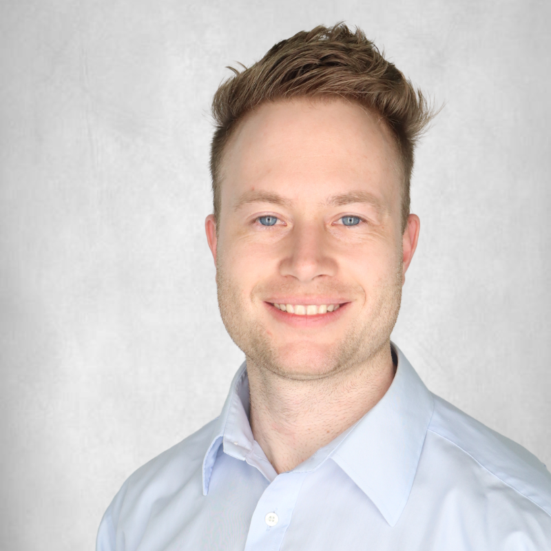 Professional headshot of Alex Wright