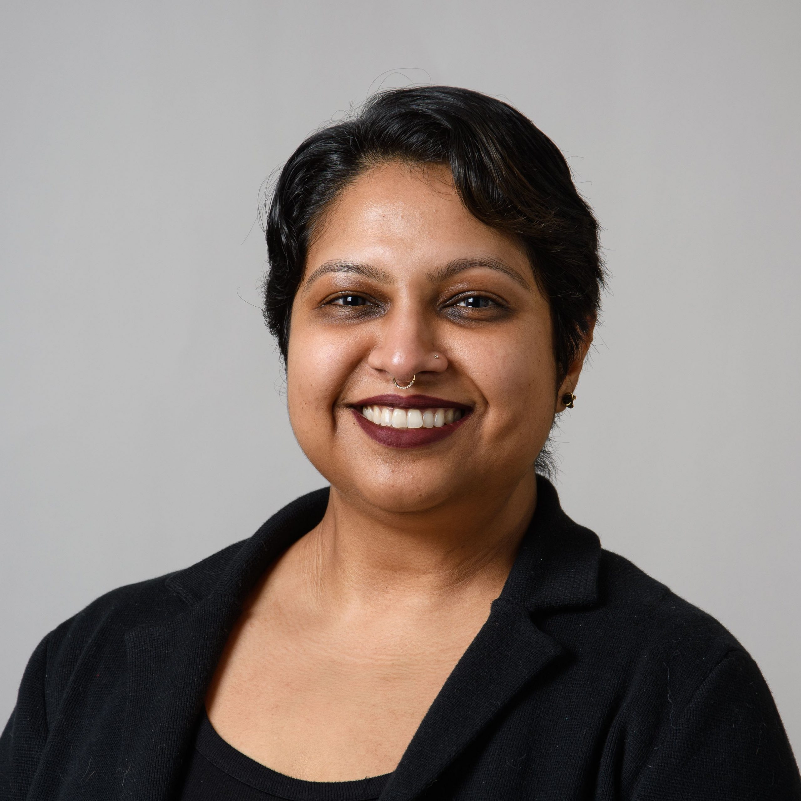 Professional headshot of Nishelli Ahmed