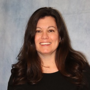 Professional headshot of Tina McCarthy