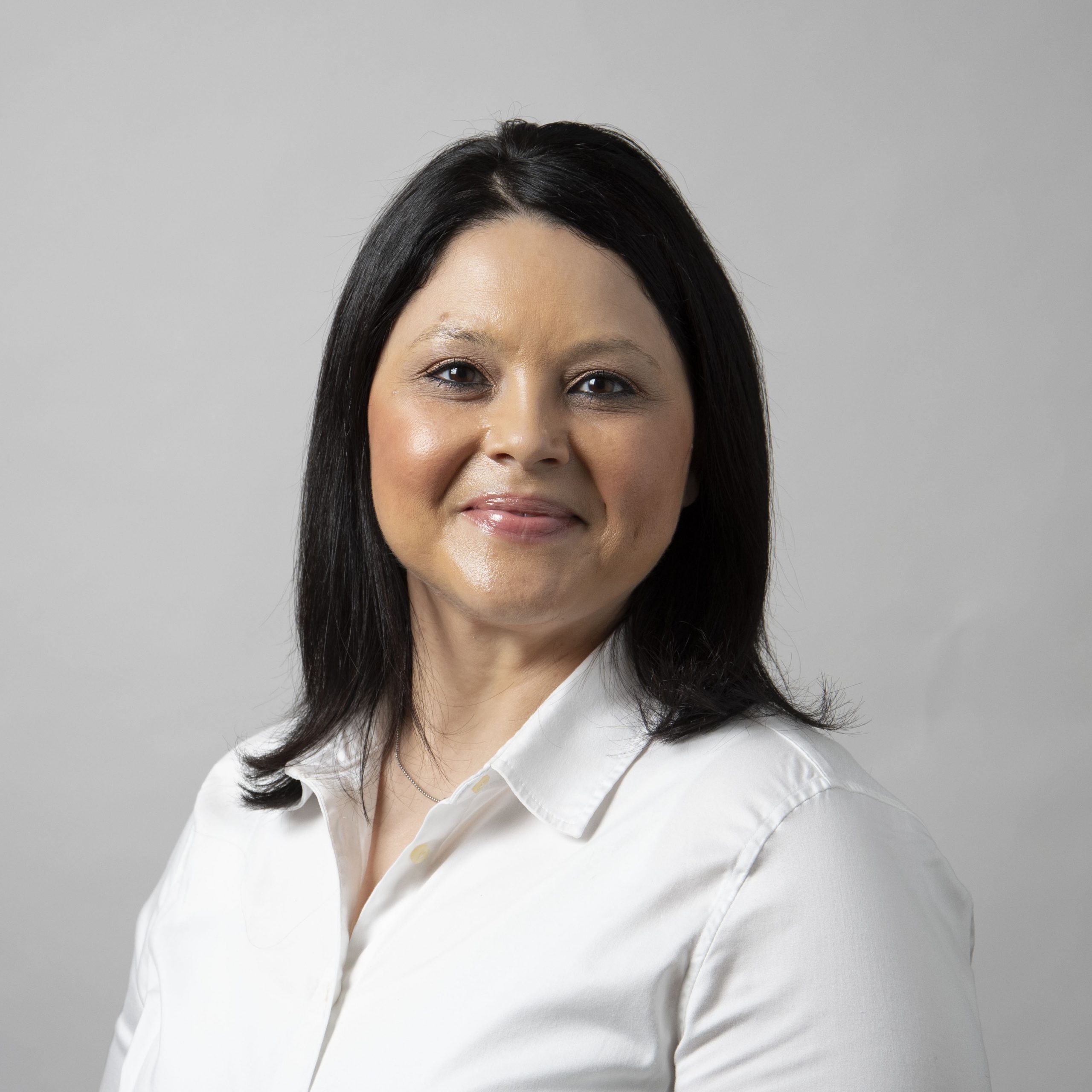 Professional headshot of Claudia Pina