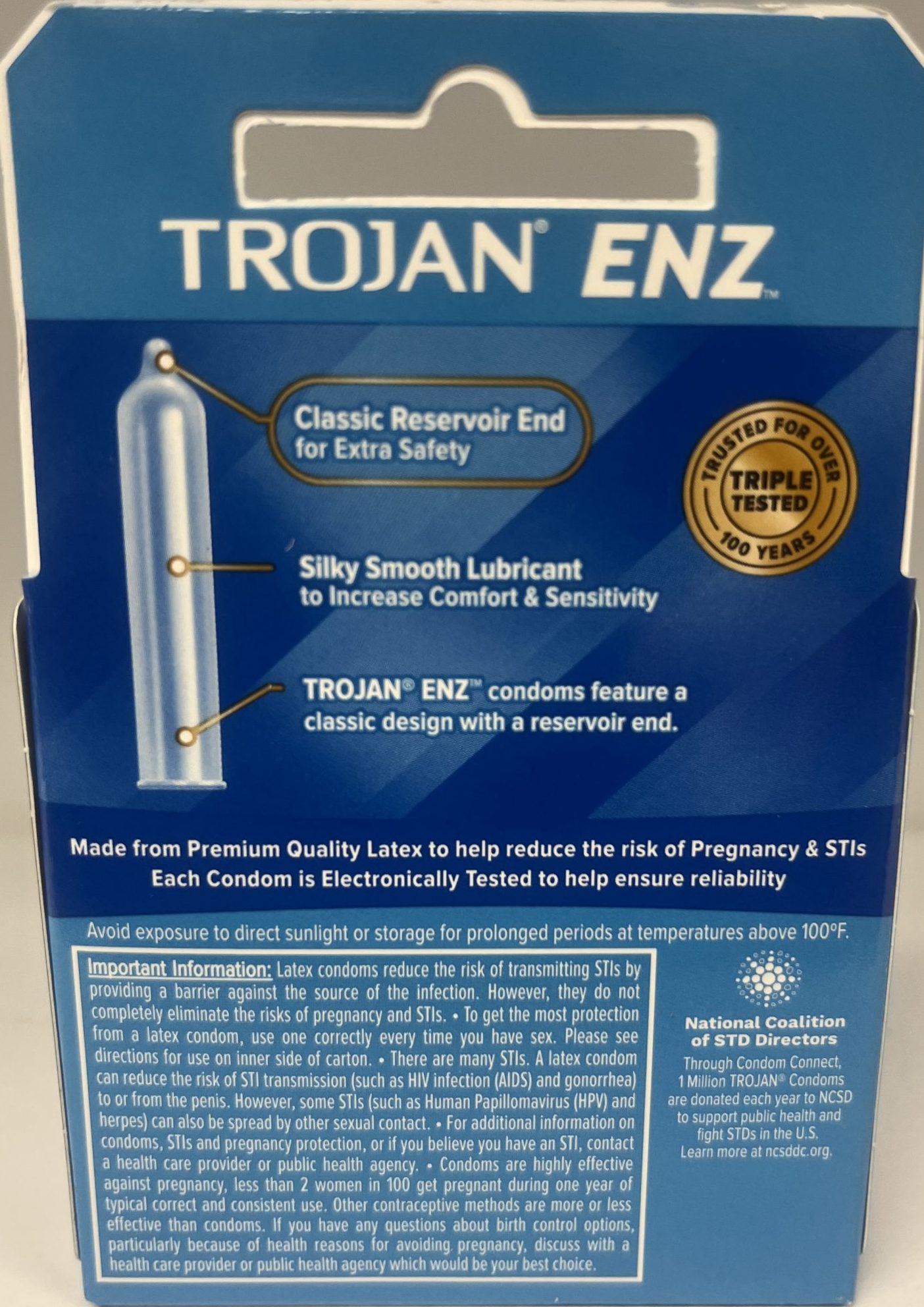 Back of Trojan ENZ condoms package highlighting latex material, reservoir tip, lubrication, and STI/pregnancy protection details.