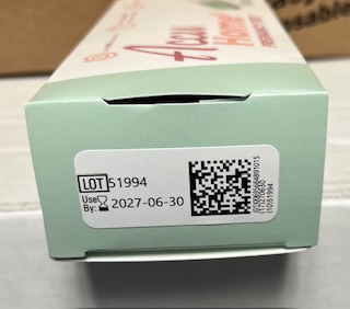 End of an Accu Home Pregnancy Test box showing lot number, use-by date, and a QR code.