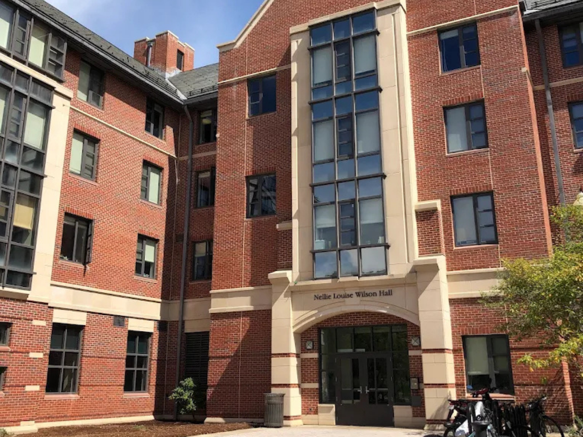 Entrance of Nelle Louise Wilson Hall with brick facade and central doorway.