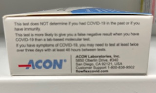 Flowflex Plus COVID-19 and Flu A/B Home Test box side with usage notes, limitations, and manufacturer contact information.