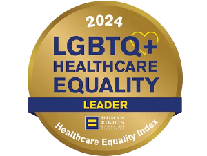 2024 LGBTQ+ Healthcare Equality Leader badge from Human Rights Campaign, gold circular emblem with blue and white text and Healthcare Equality Index mention.